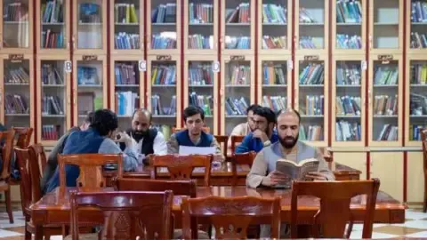 Afghanistan's rulers outlaw publications written by female authors from the nation's colleges